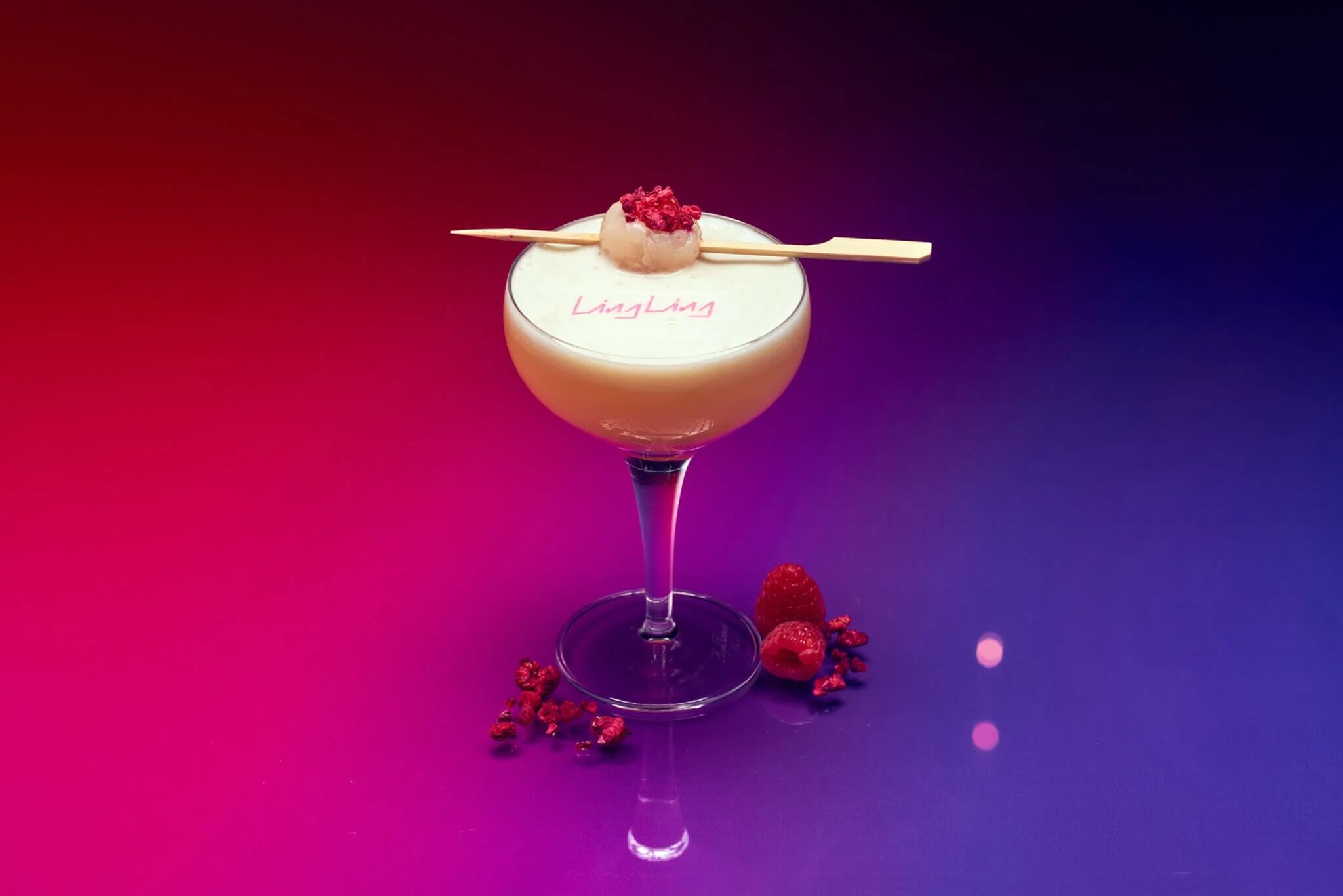 Cocktail with lychee garnish