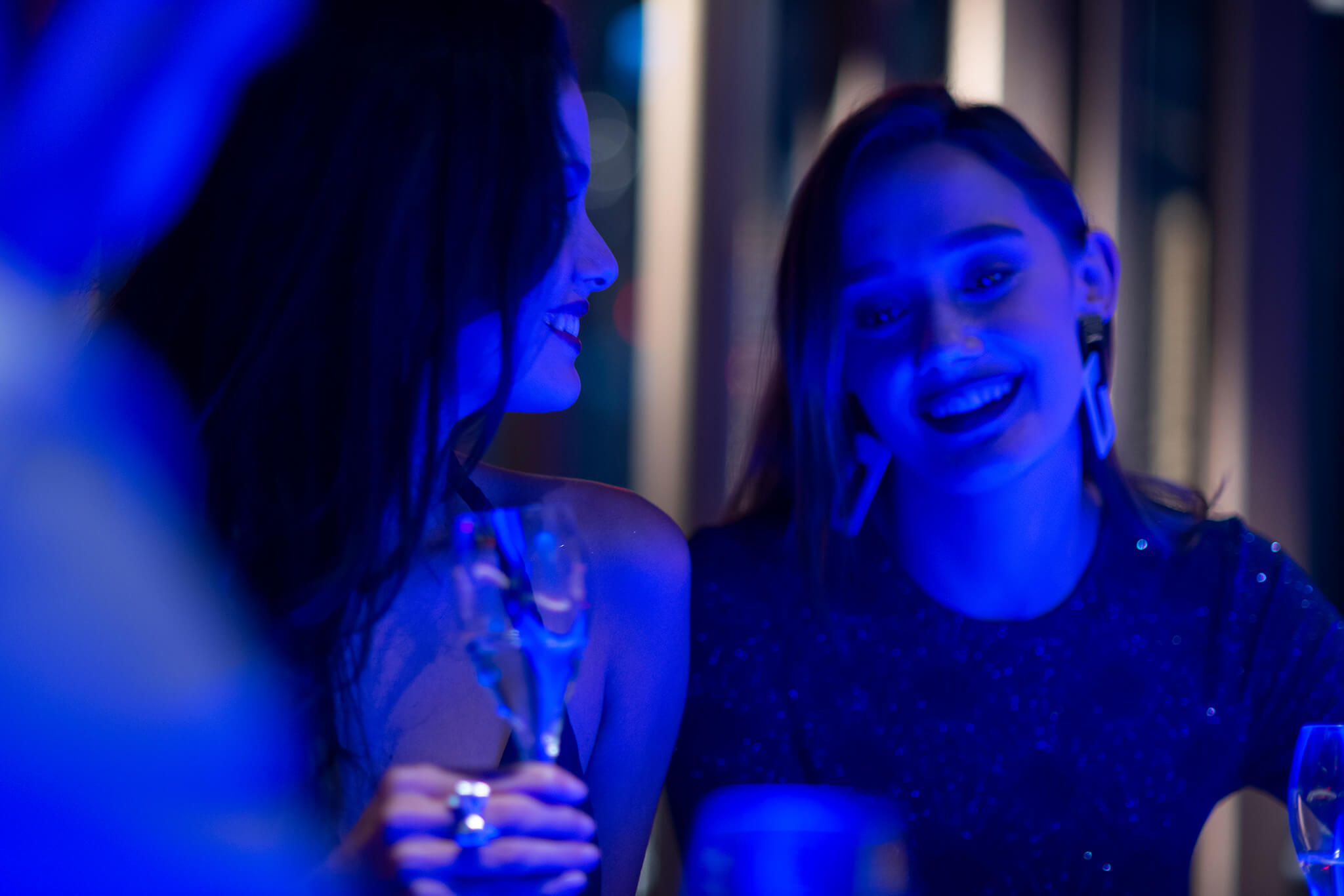 woman at bar with drink